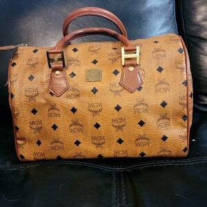 Authentic MCM bag in very good condition.Will throw in free chain too